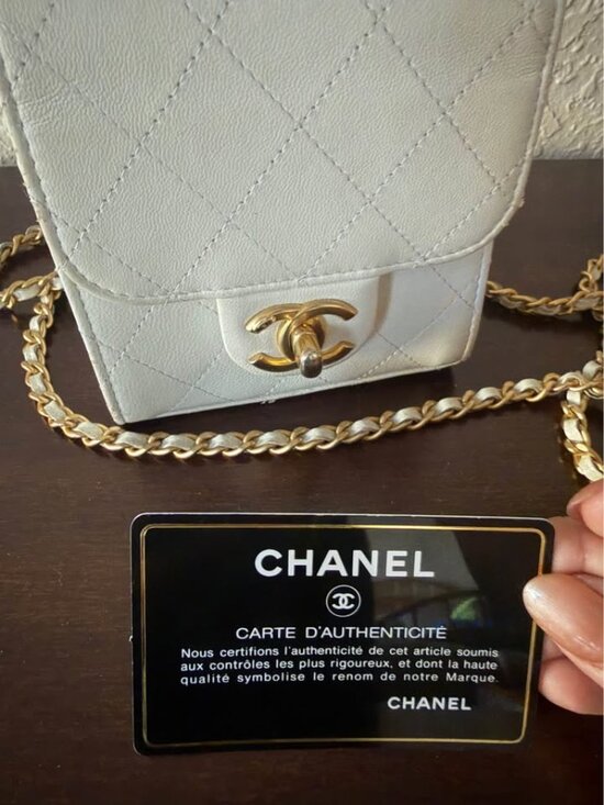 CHANEL Handbags - Chanel mini flap with a pearl top handle